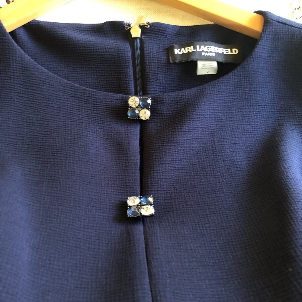 NWOT Karl Lagerfeld Paris Dress size 4 with 2 crystal buttons. Never used.